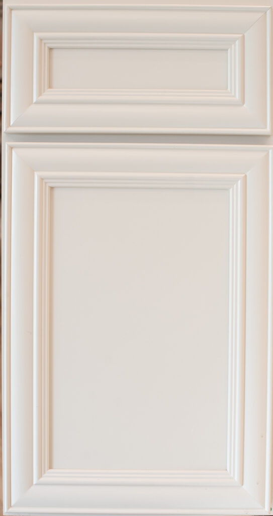 Traditional cabinet door with quarter-inch panel in Agreeable Grey paint on maple.